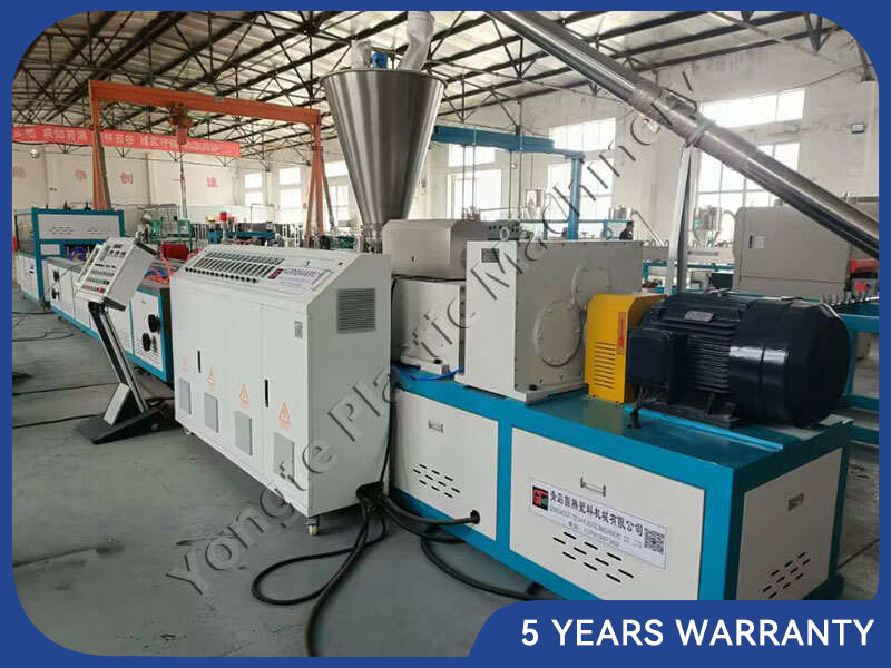 Key components of a plastic profile extrusion machine include